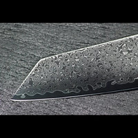 Detailansicht der charakteristischen spitz zulaufenden Klinge des SKeld® Damast Kiritsukemessers