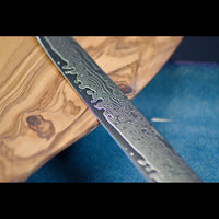 SKeld® Damast Ausbeinmesser mit klar sichtbarer Damaststruktur im VG10 Stahl mit 67 Lagen Damaststahl